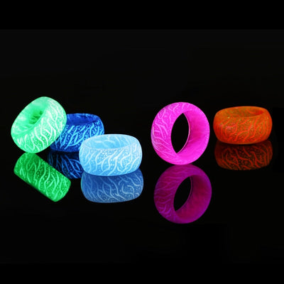 Love Glow Ring - A stylish and luminescent accessory perfect for any nightlife event or special occasion. Made of non-toxic translucent resin, available in pink, light blue, dark blue, green, and orange colors. Start meaningful conversations with its captivating glow. Great for both single individuals and as gifts. Unisex design. Package includes one Love Glow Ring.